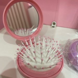 Mini espelho com escova de cabelo